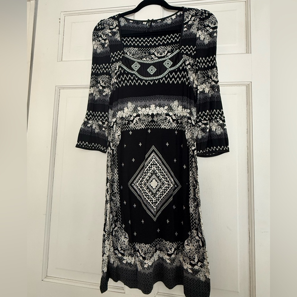 Black pattern dress with details